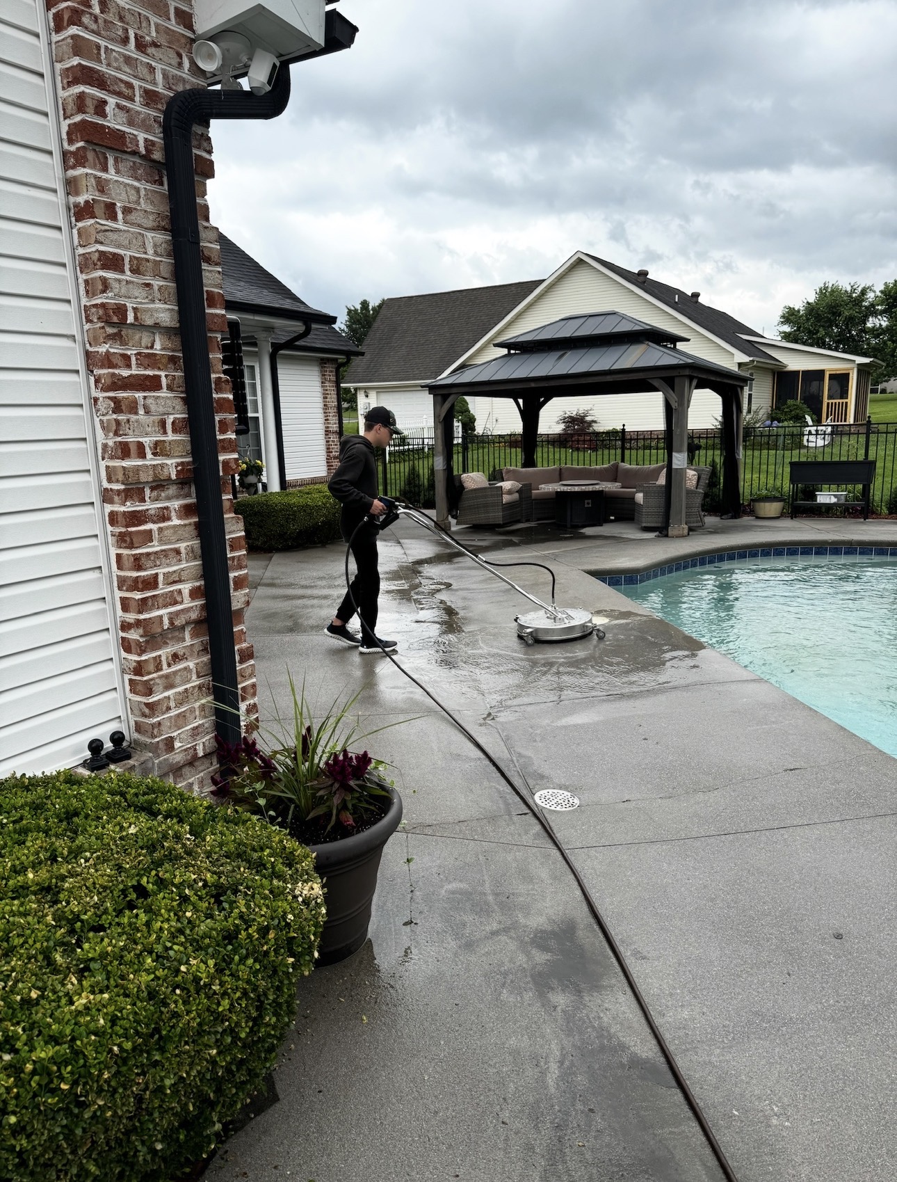 Pressure washing pool deck and patio
